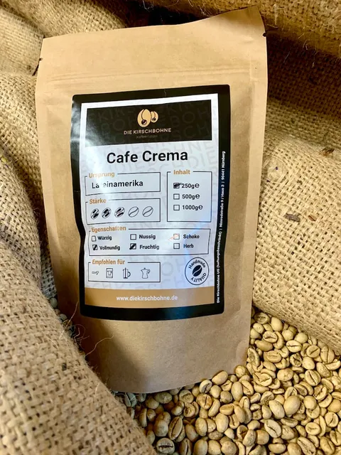 Cafe Crema in der originalen Kirschbohne-Kaffeetüte auf einem Jutesack